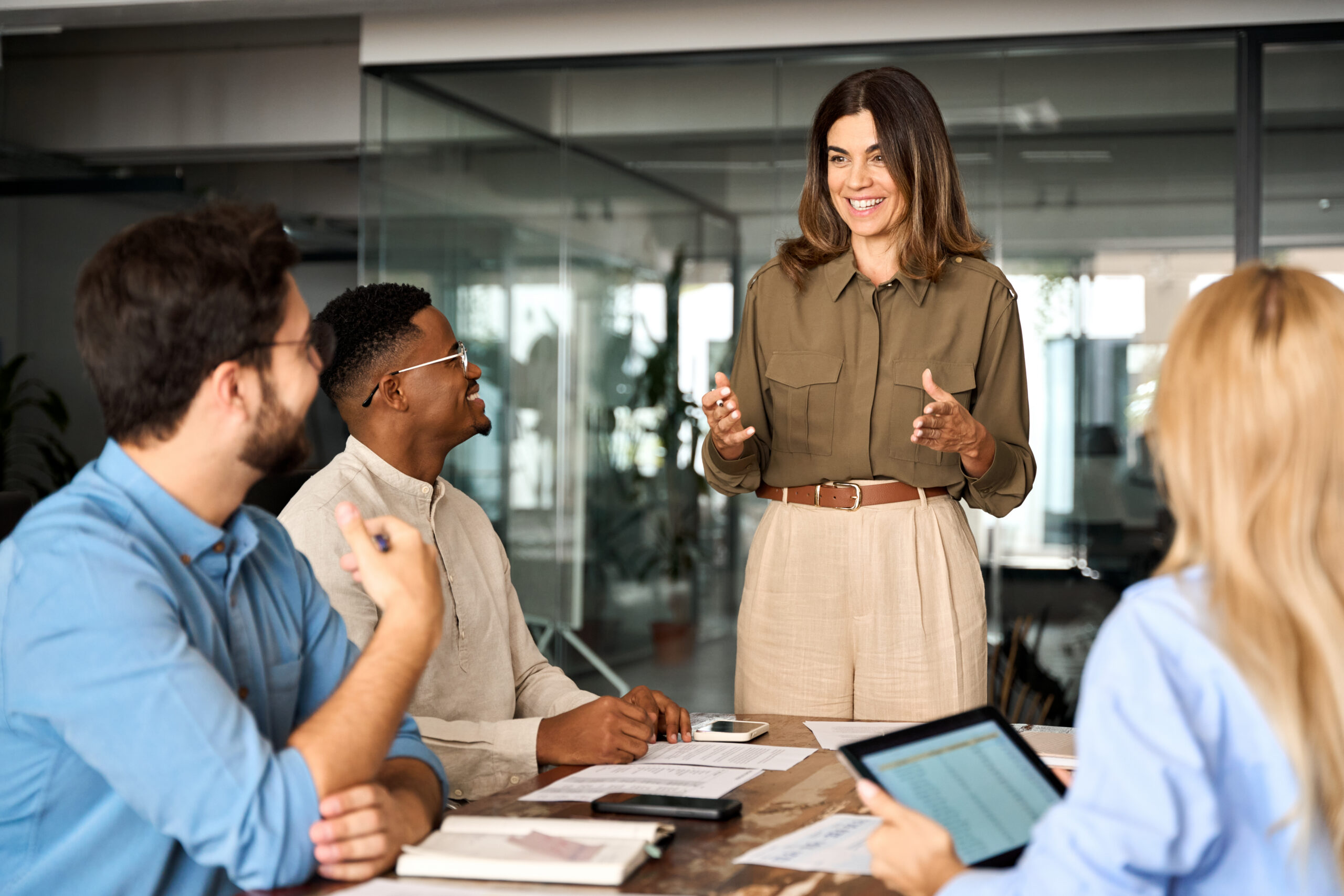 Franchise business coach in a one-on-one coaching conversation with a franchisee leader